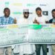 R-L: Fela Ibidapo, Divisional Head, Corporate Communications, Heritage Bank; winner of YNSPYRE draw, John Njoku; Dapo Oyebanjo (D'banj) and Ihotu Esther Etodo who was presented with the cheque of N200, 000 won in the March monthly draw, during the 2nd monthly draw of Heritage Bank’s YNSPYRE product in collaboration with CREAM Platform, at the weekend in Lagos.